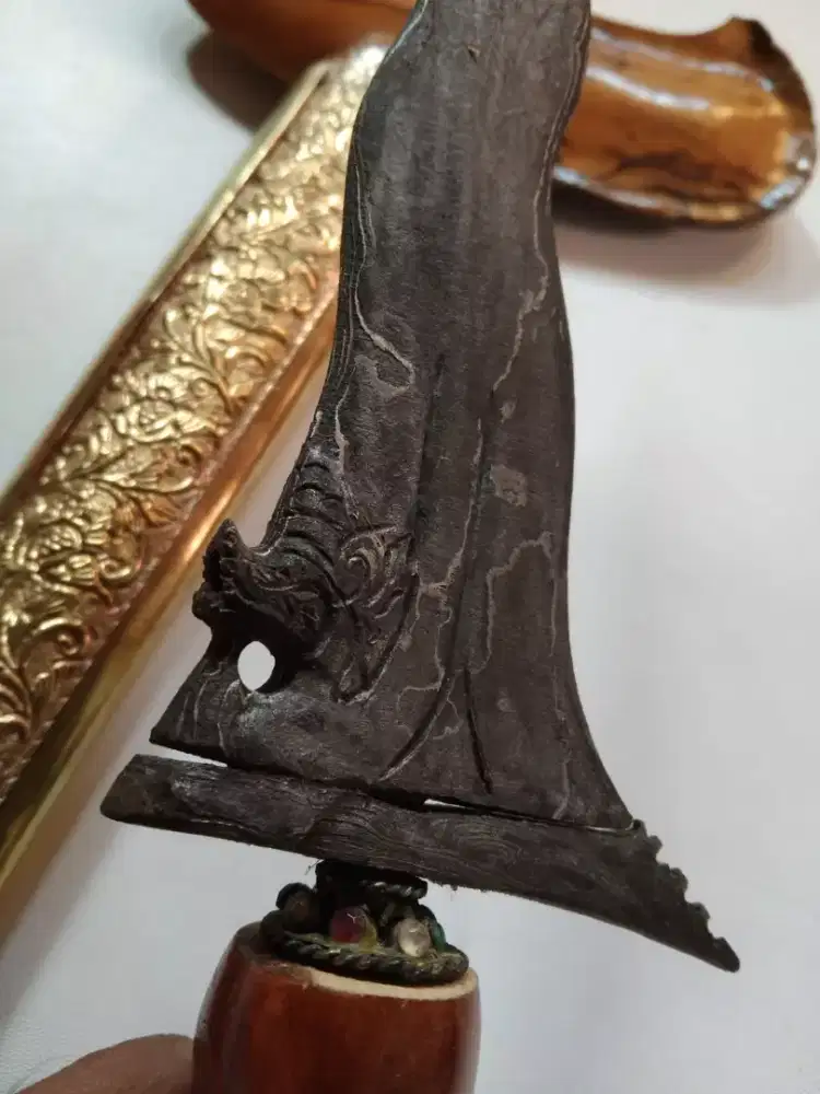 Keris Naga Sasra Luk.11