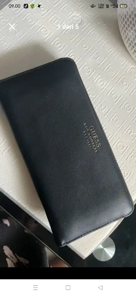 dompet guess original counter