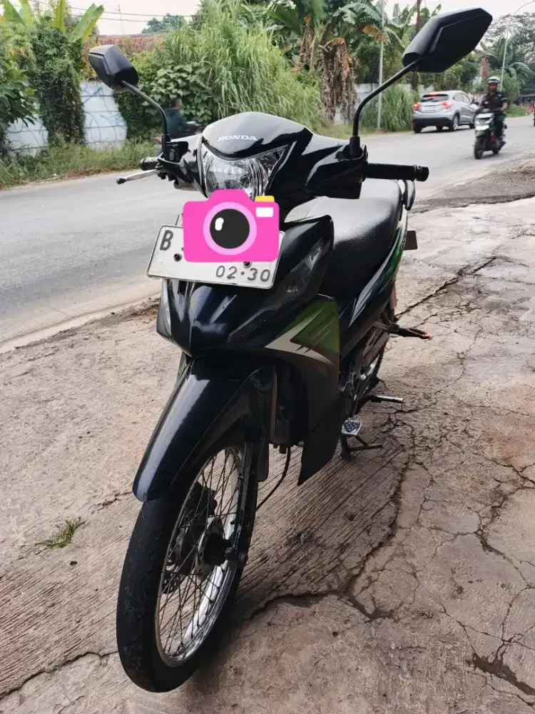 Honda Revo Injection