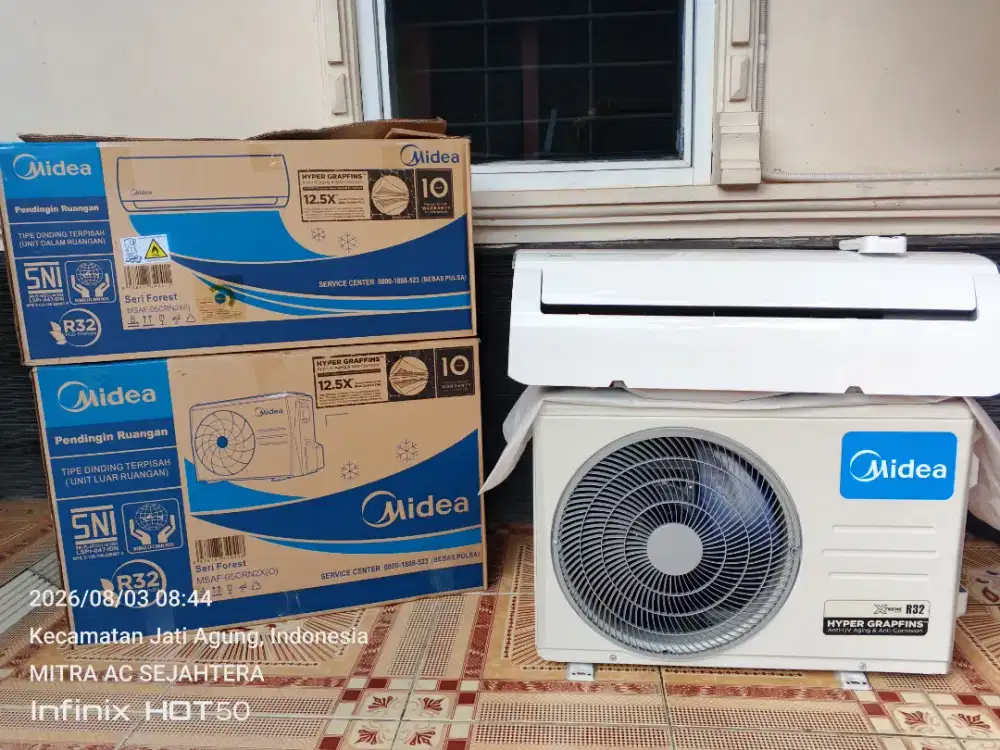 Ac seken 1/2pk  Merk midea