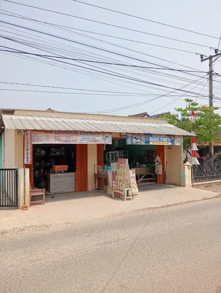 Rumah + Dua Kios