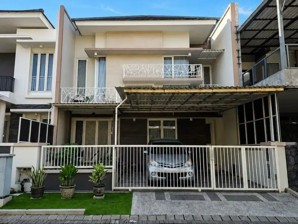 Rumah Florence, Pakuwon City Strategis • Minimalis • Carport 2