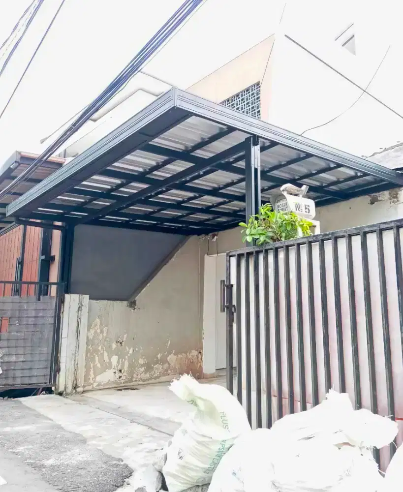 Kanopi baja ringan dan garasi