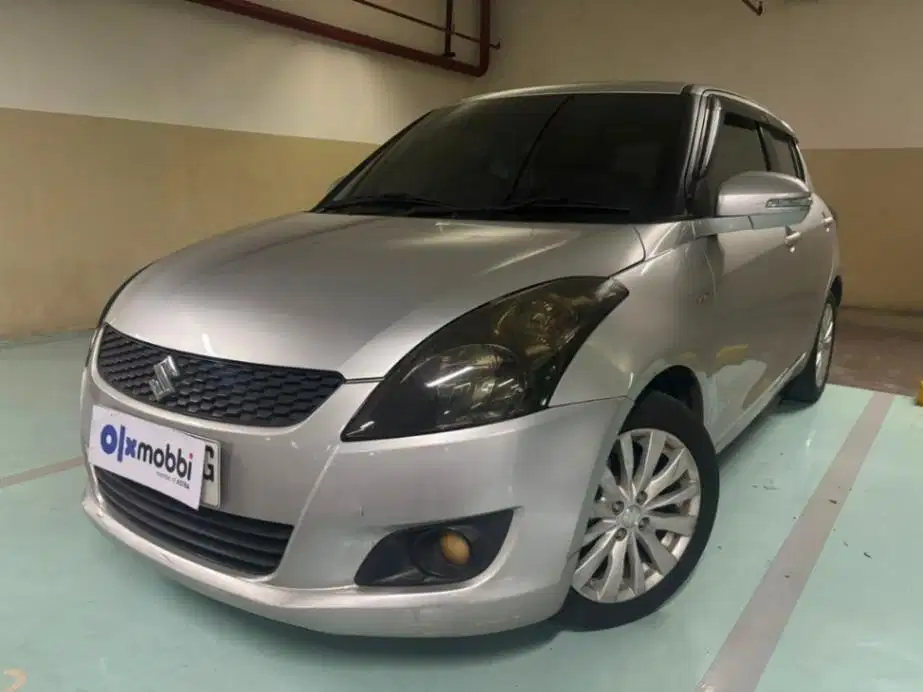 LOW DP Suzuki Swift 1.4 GX Bensin-MT 2013 TYG