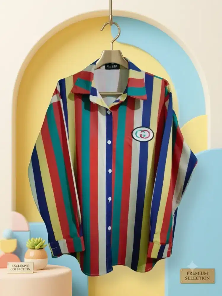 Kemeja bermotif garis vertikal multi-warna memberikan gaya playful