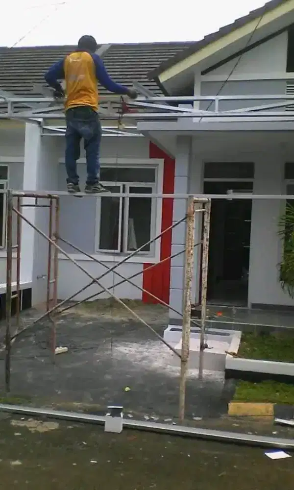 Tukang kanopi ganti atap rumah renopasi bangunan