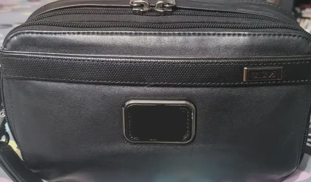 Tumi clutch alpha 3