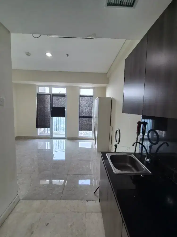 Disewakan Termurah Studio Unfurnish Apartement Puri Orchard