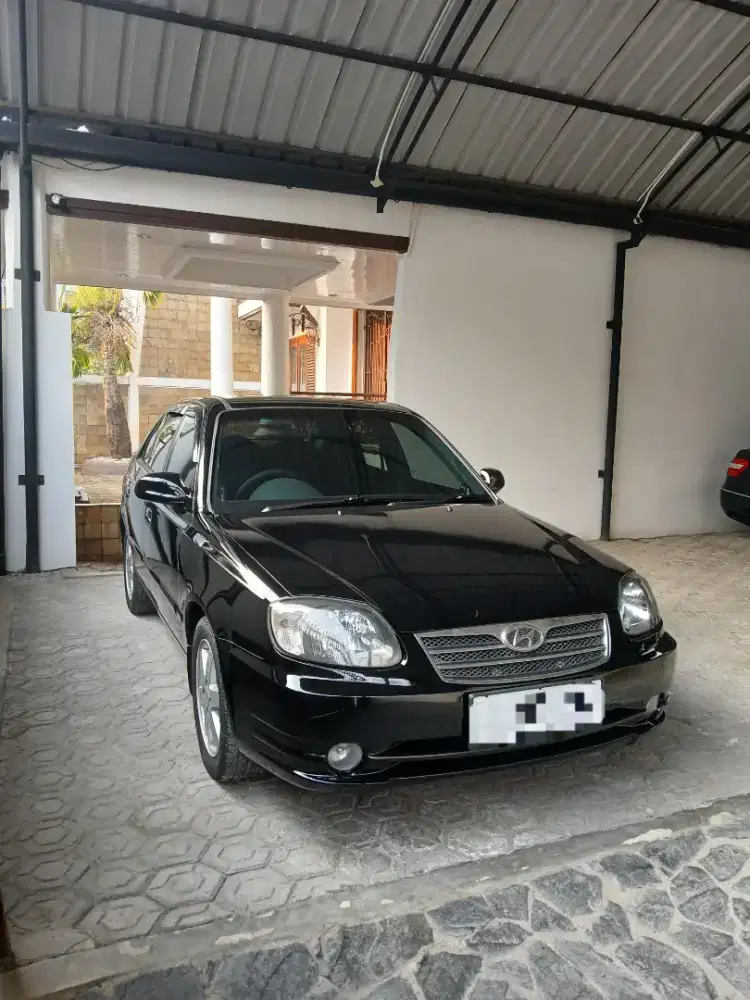 Hyundai avega xg at 2011 hitam tdp.17.5jt