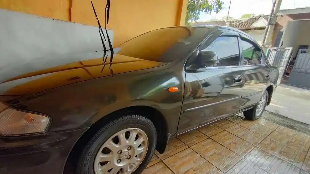 Mazda 323 1998 Bensin