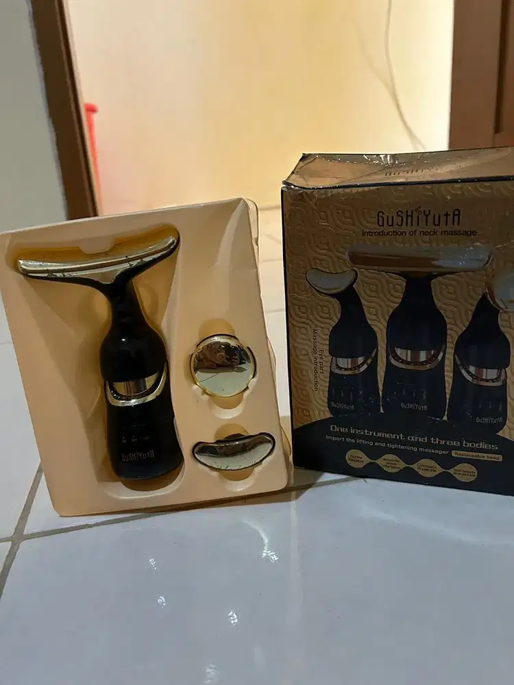 Alat pijat wajah