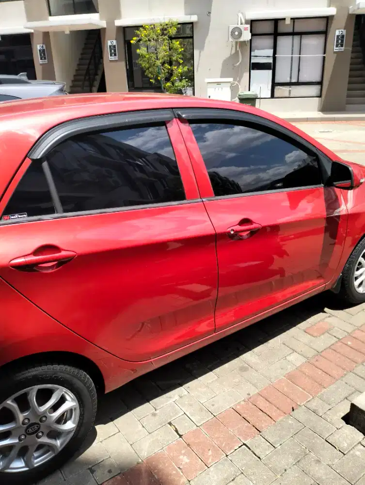 Lapak pemasangan kaca film mobil