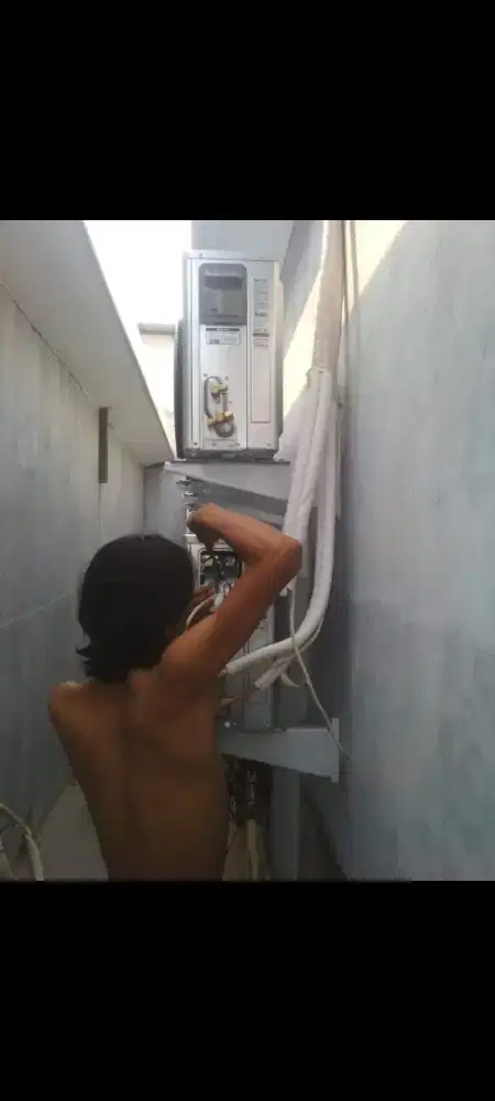 Service AC bongkar pasang