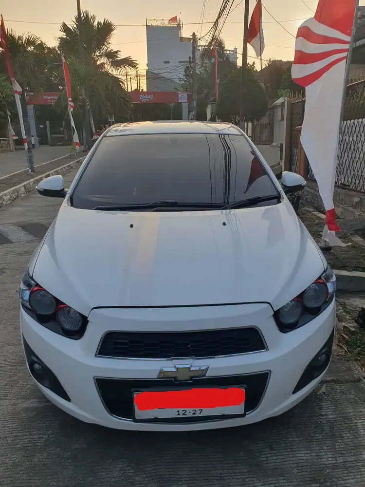 Chevrolet Aveo Sonic  MT 2014 Putih Velg Ring 17 Siap DiAjak Nongkrong