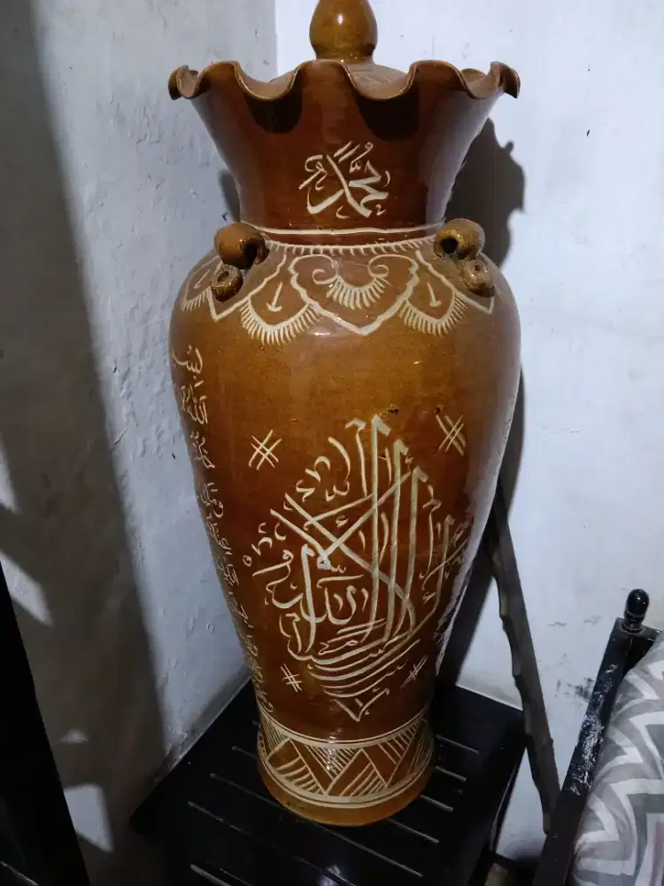 Gucci tulisan Arab