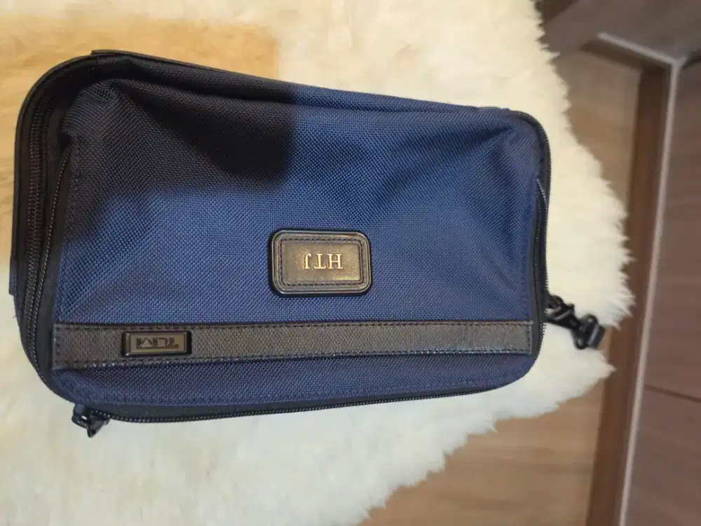 TUMI original alpha clutch bag