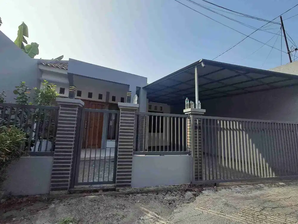 Rumah cakep siap huni KT3, hadap Barat dengan carport luas