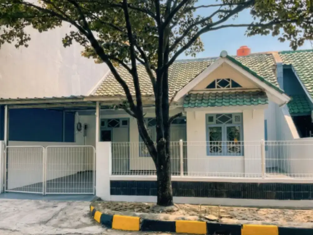 Rumah Strategis Mekar Indah - Lokasi Tenang, Desain Nyaman, Luas Tanah 180 M².