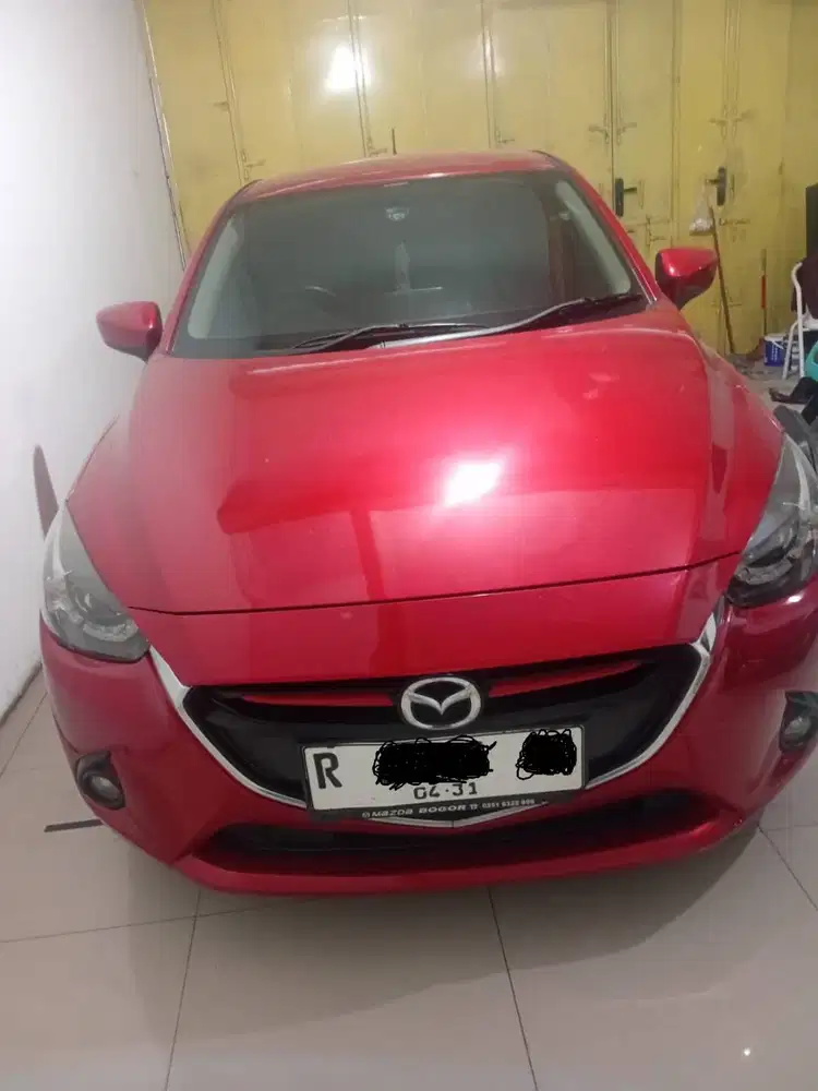 Mazda 2 2014 Merah Manual Bensin