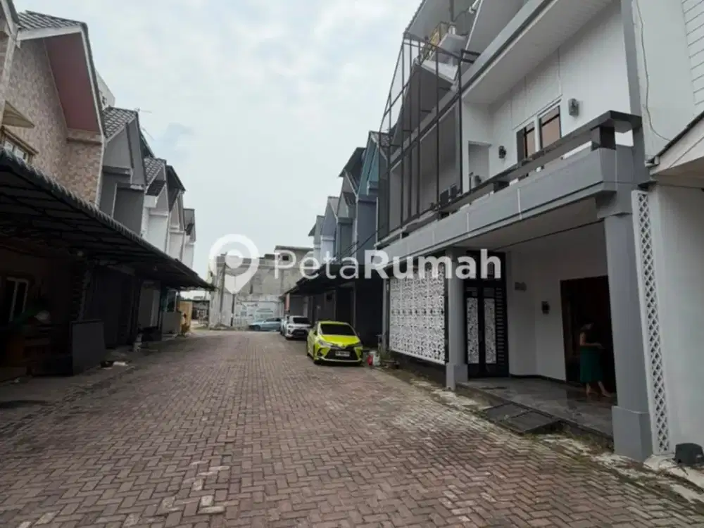 DIJUAL RUMAH JALAN KL YOS SUDARSO KOMPLEK MULIA TOWNHOUSE - DAERAH TANJUNG MULIA MEDAN DELI (lisa)