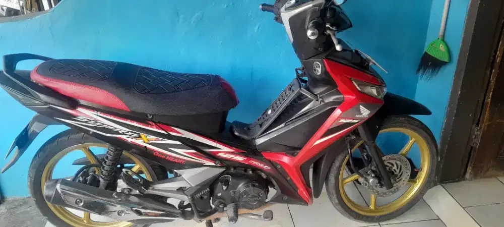 Motor bekas supra x 125