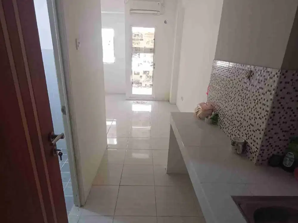 Apartemen Puncak Dharmahusada Tower B