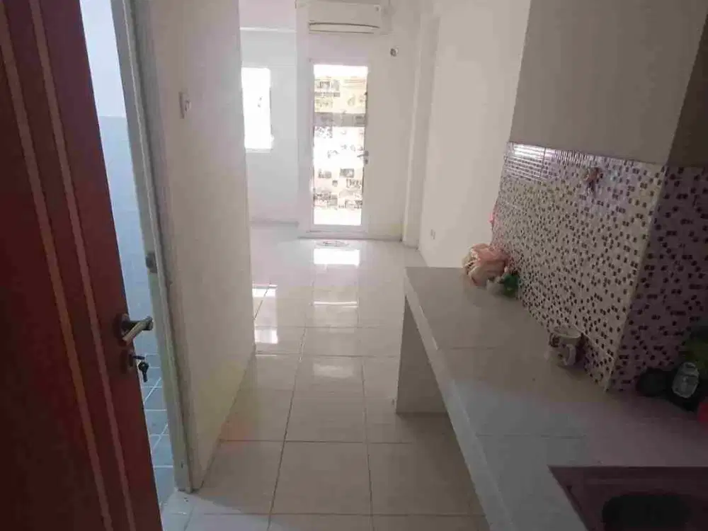 Apartemen Puncak Dharmahusada Tower B