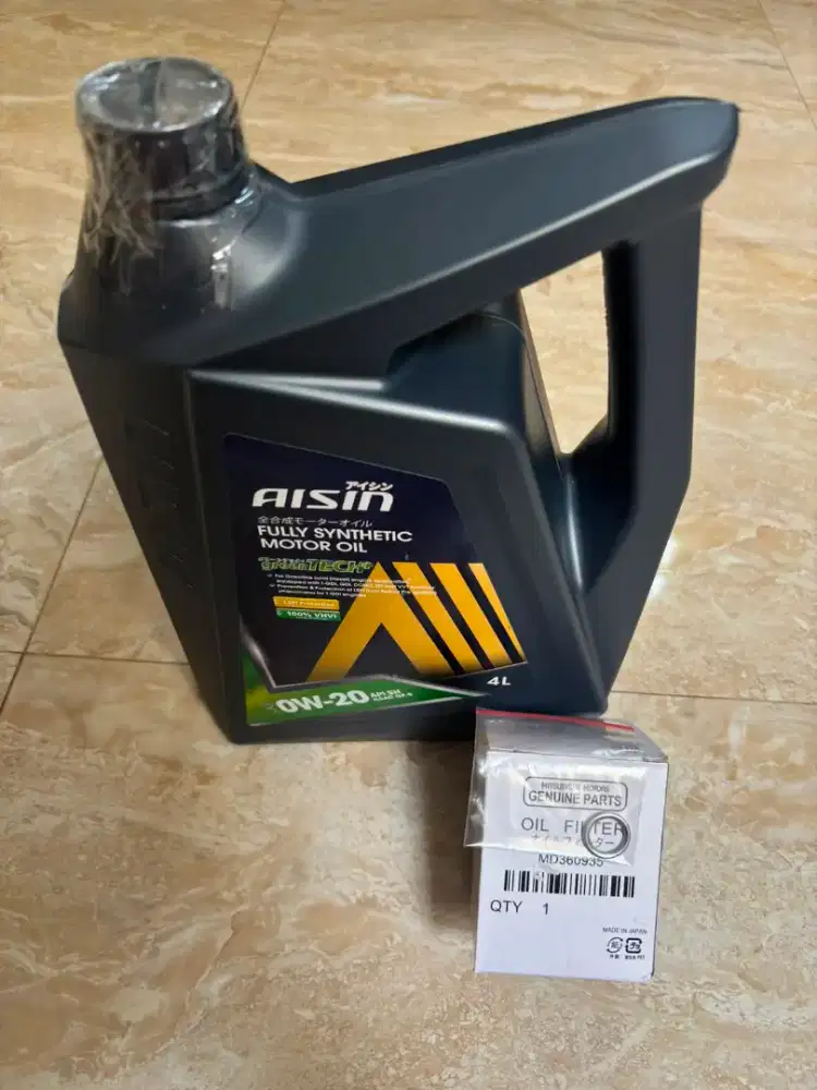 Oli xpander/new livina Aisin 0w-20 + filter oli dan ring baut