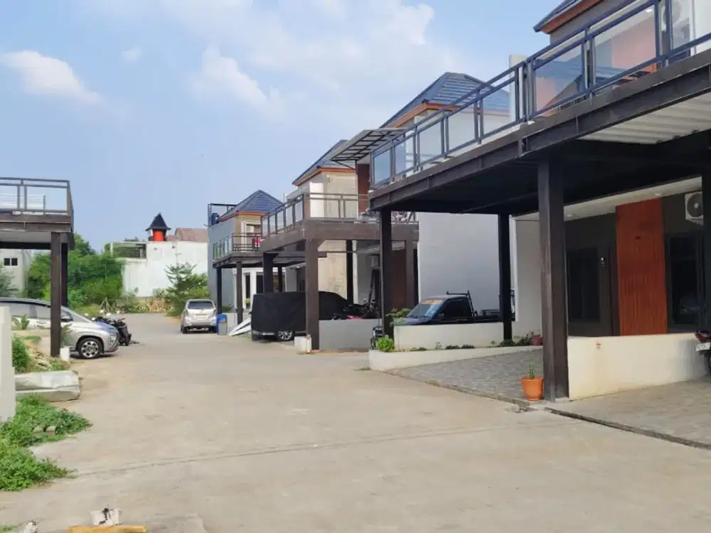 Rumah 2lantai super murah cuma 900juta an lokasi dekat pintu  Tol Jatiwarna