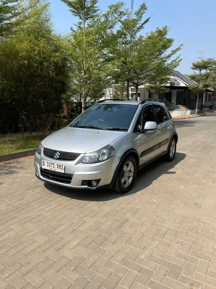 DP 5 JT | SX4 X OVER 2011 MANUAL