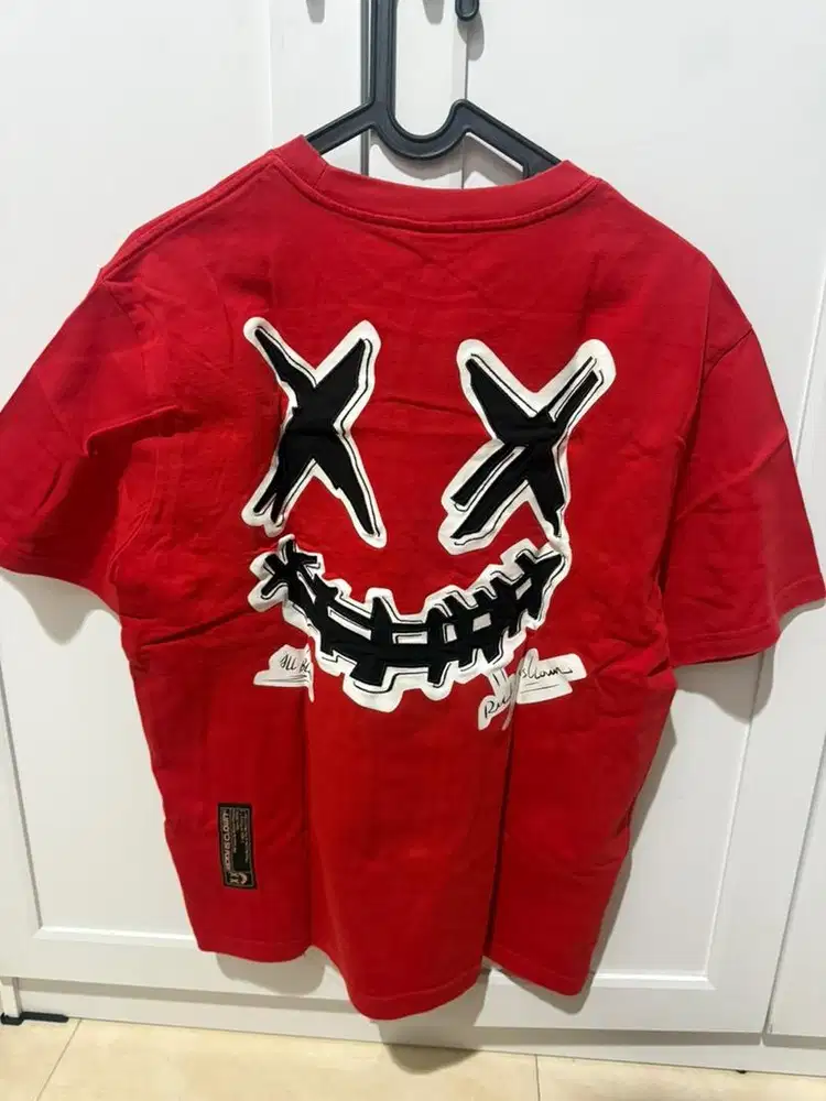 Ricky is a clown line tear smiley tee red