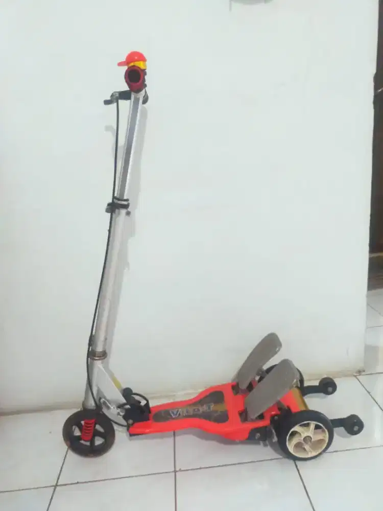 Skuter injak Vita-D dual pedal