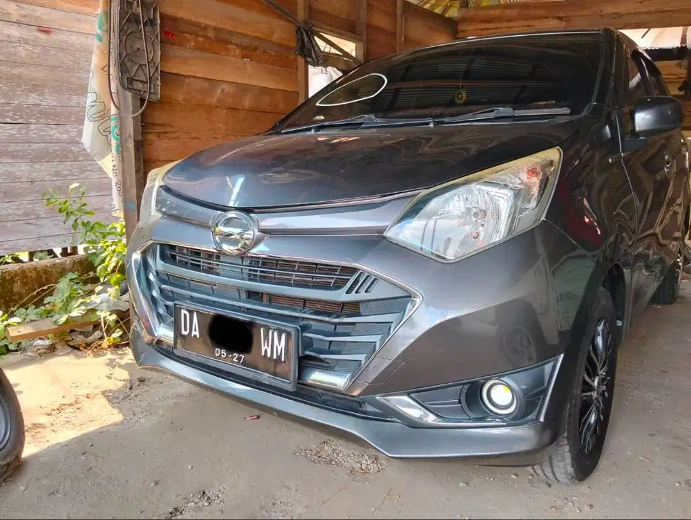 Sigra x 1.200 cc manual