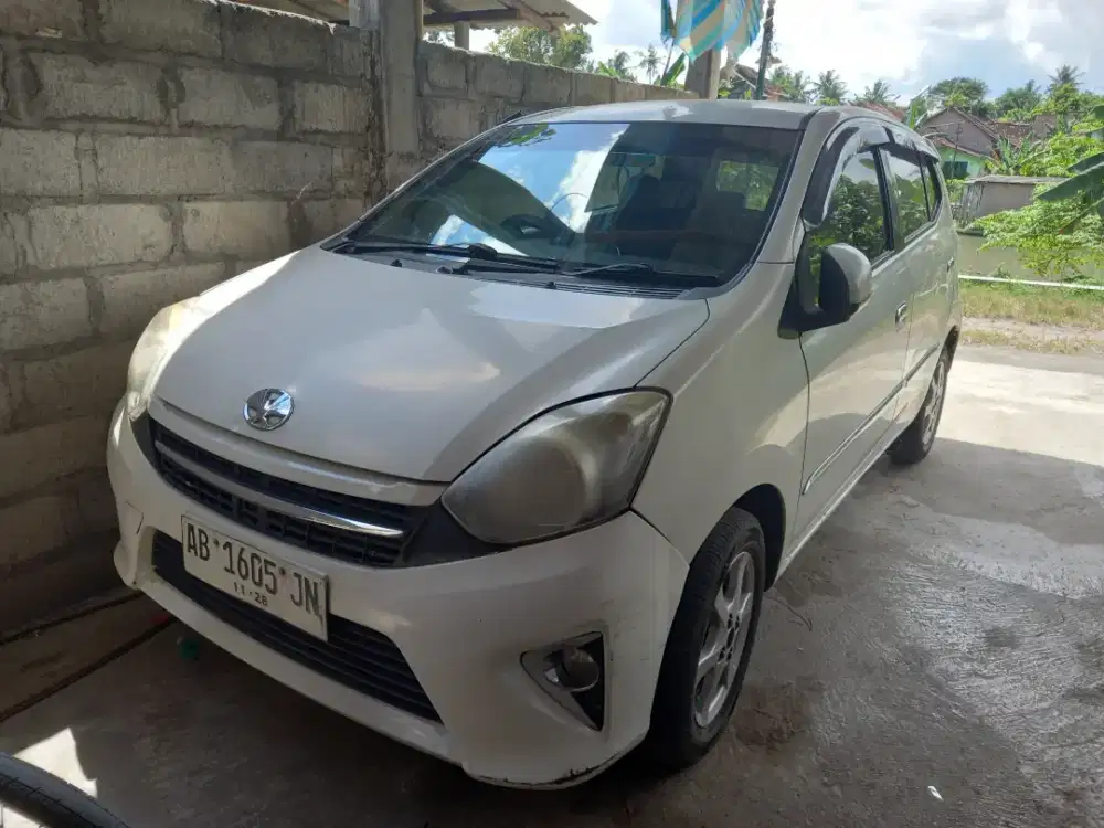 Mobil agya 2013 manual putih