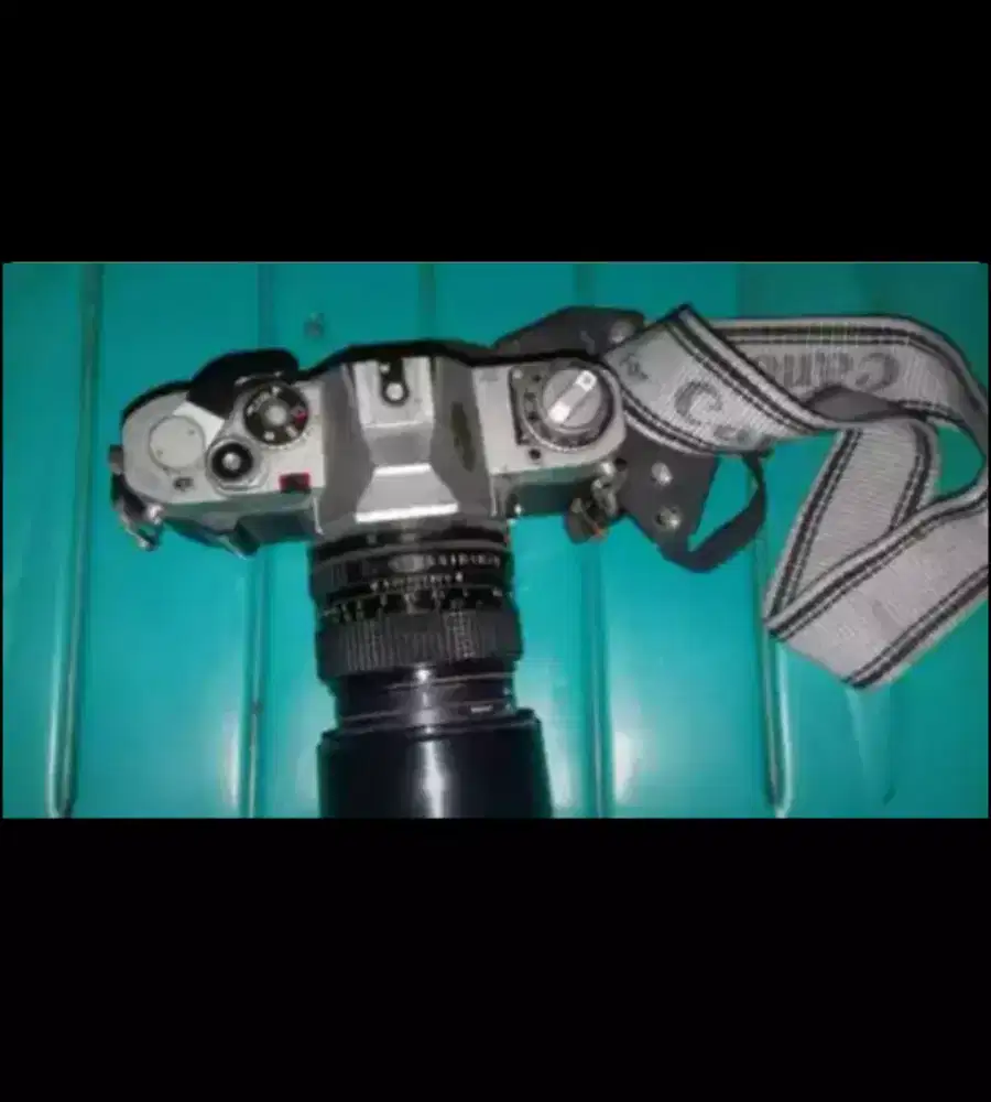 Kamera Canon AV-1 plus lensa