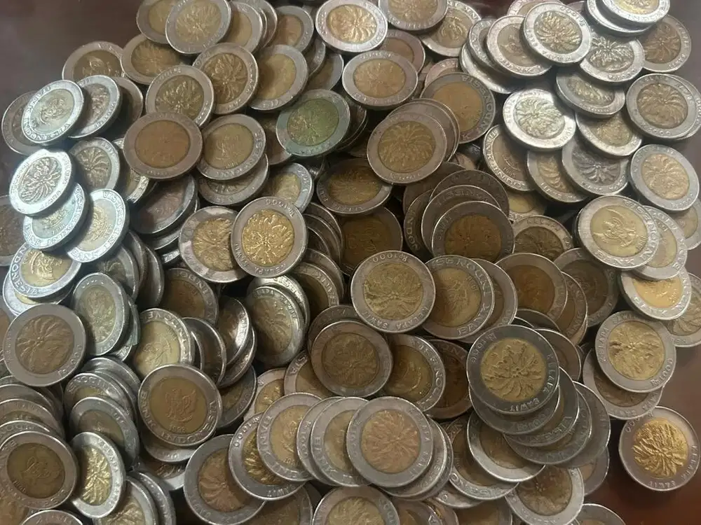 Koin 1000 Rupiah kelapa sawit.