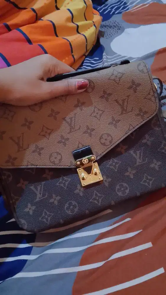 Tas Louis Vuitton Pochette Metis