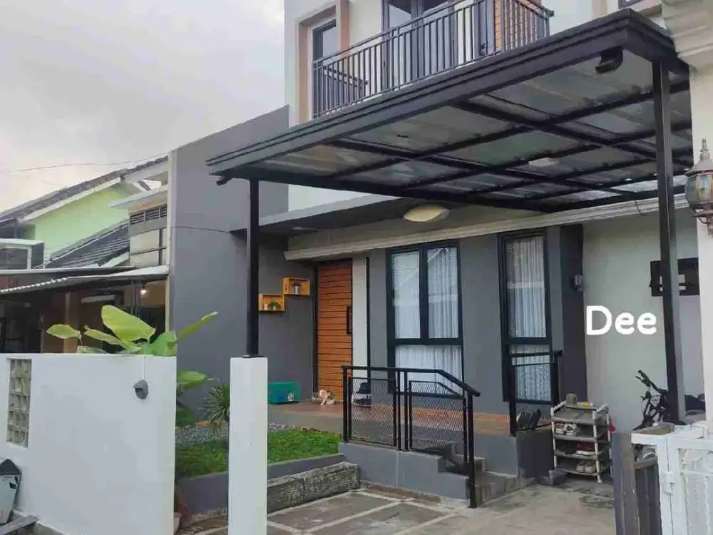 JUAL RUMAH MODERN TROPICAL JATIASIH BEKASI SHM DEKAT DENGAN AKSES TOL RAPI SIAP HUNI