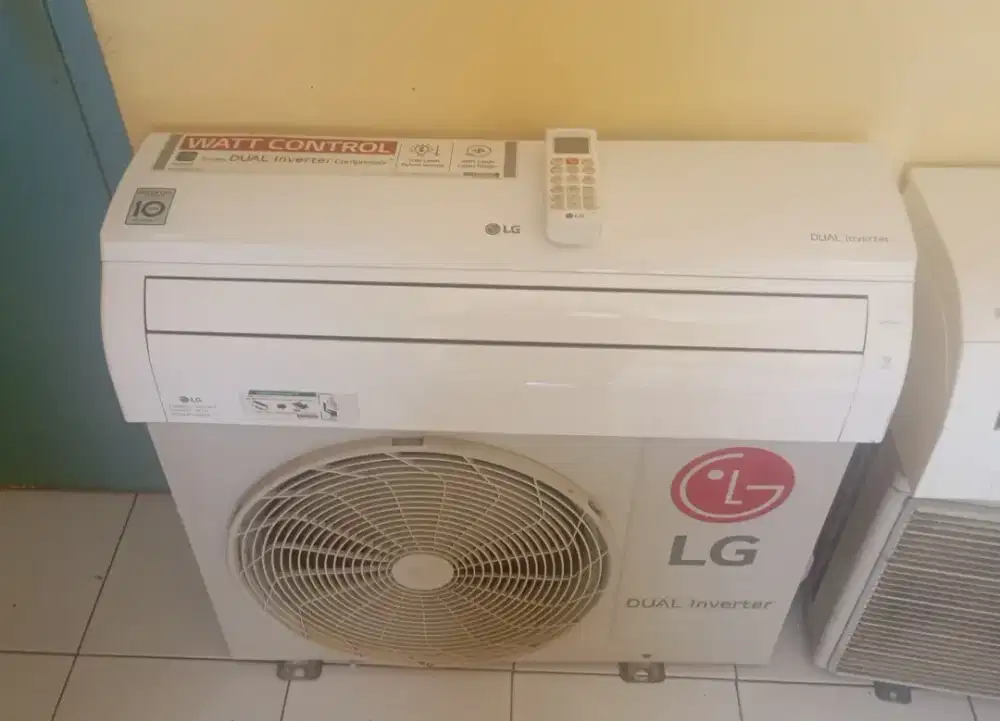 ac LG dual inverter 1/2pk R32 ori