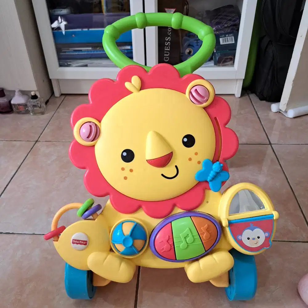 Fisher Price Musical Lion Walker - Alat bantu anak belajar jalan