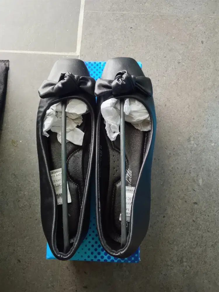 Sepatu Yongki Komaladi