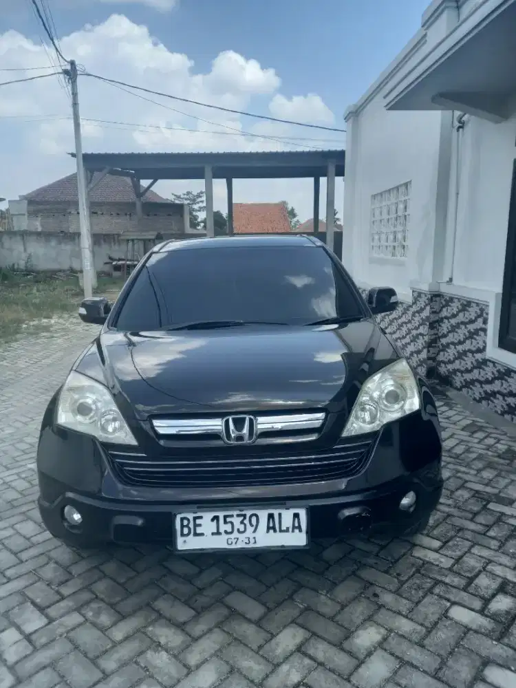 Dijual mobil honda CRV 2.4 AT Tahun 2009 warna burgundy