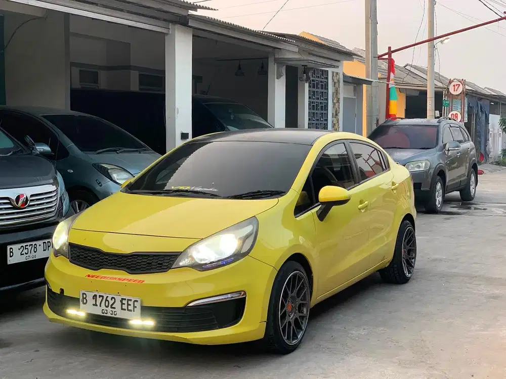 kia trio sedan murah