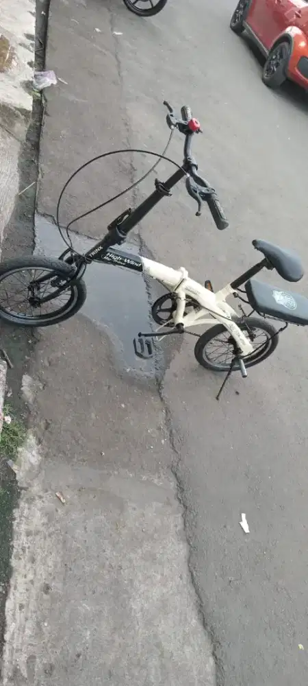 Sepeda lipat ukuran 16 350k nett