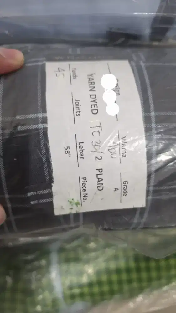 Kain premium kondisi belum terpakai