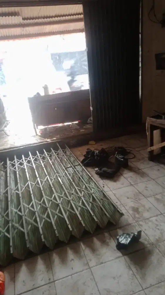 Tukang service pintu rolling door dan folding gate bergaransi