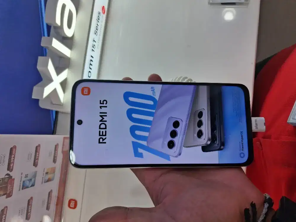 Redmi 15 . . . .