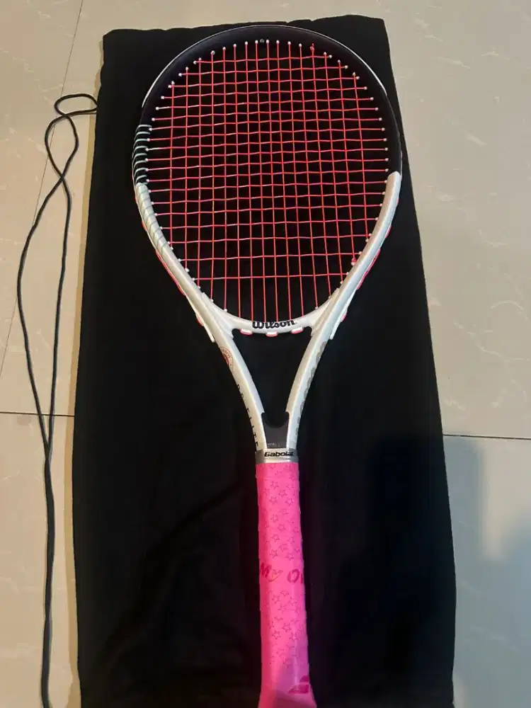 Raket tenis merk Wilson
