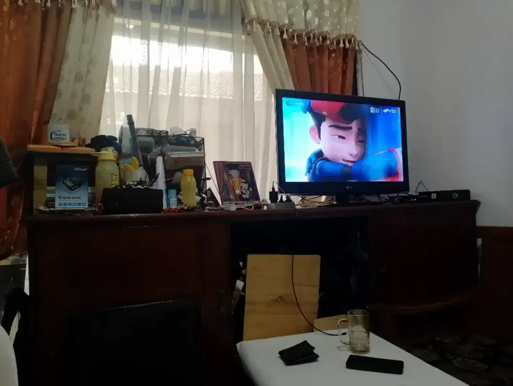 Lemari TV untuk ruang tamu