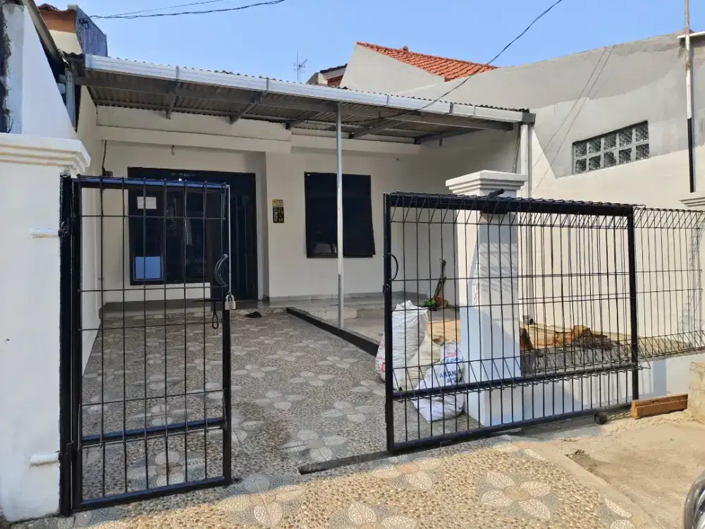 Disewakan rumah 90m2 pinggir jln raya akses 2 mobil